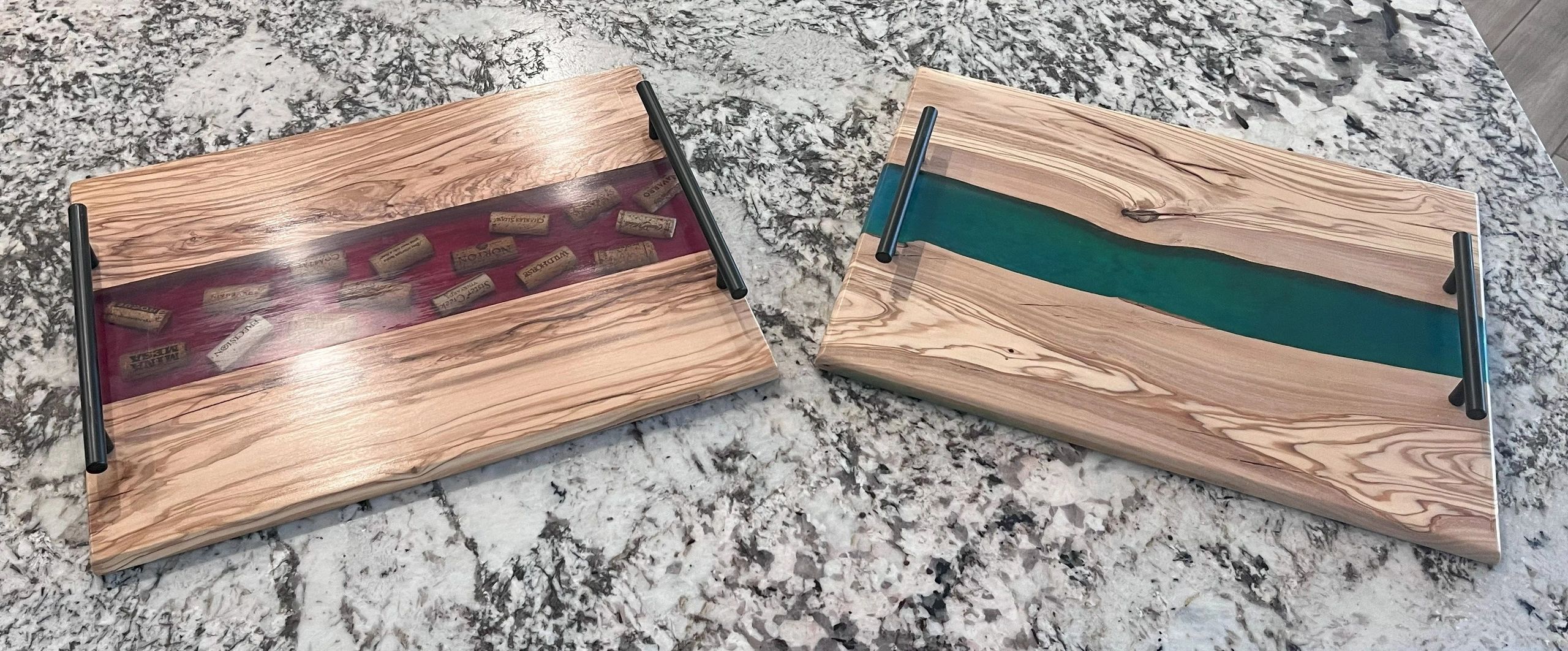Two handcrafted live-edge wood and resin serving trays